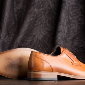 Brand new Classic cognac derby shoes.